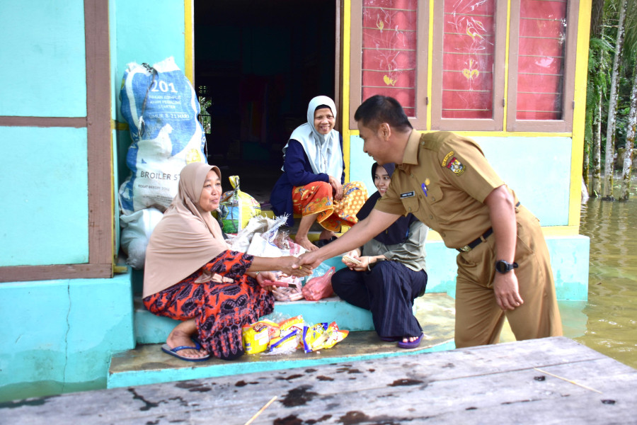 Pasca Dibuka Pintu PLTA Koto Panjang, Pemkab Kampar Salurkan Bantuan ke Desa Terdampak