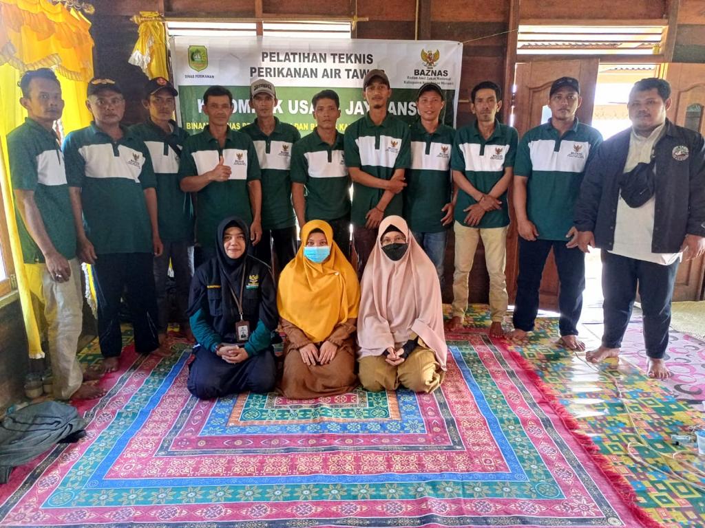 Pendamping Program Badan Amil Zakat Meranti Bersama Dinas pemeliharaan ikan air tawar.